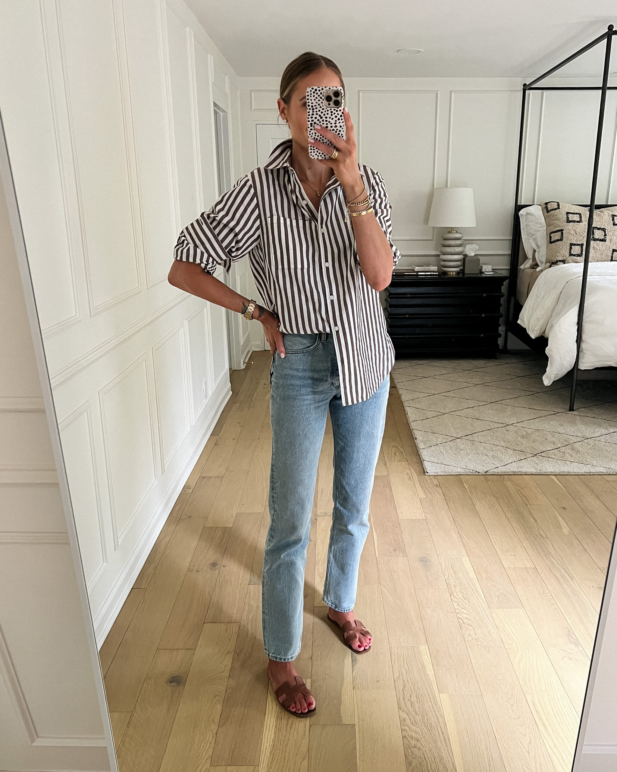 Fashion Jackson Wearing Amazon Drop Striped Button Up Shirt AGOLDE Lana Jeans Hermes Oran Gold Sandals